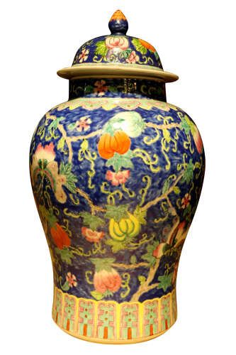 fig 1. A baluster-shaped Chinese porcelain ginger jar with a fitted domed lid featuring hand-painted gourd vines and butterflies over a cobalt blue ground.