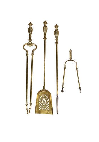 fig 2. A set of early 20th-century brass fireplace accessories featuring a pair of fire dogs, a shovel with a pierced blade, tongs, poker, and rest.