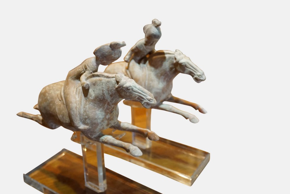 A Pair of Tang Dynasty Terracotta Leaping Horses