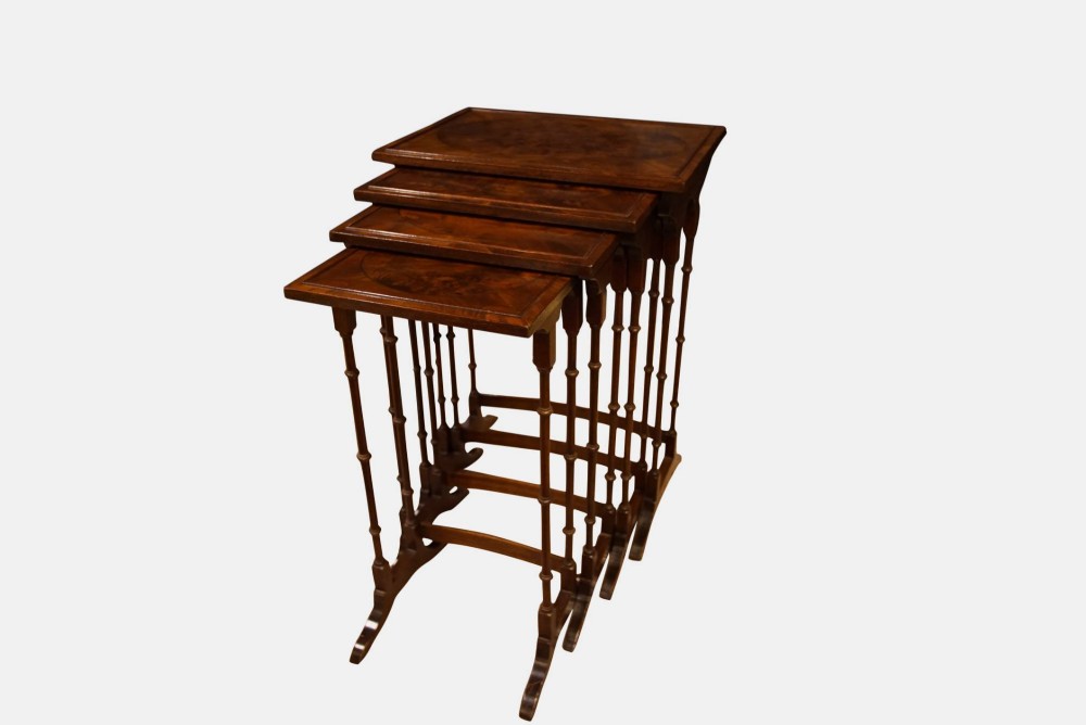 Nest of 4 Mahogany Tables