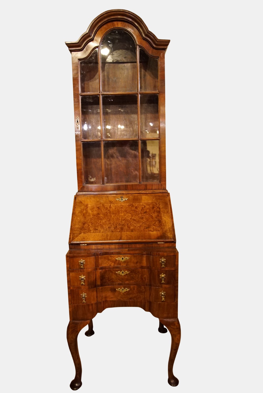 A Burr & Figured Walnut Queen Anne Style Bureau-Bookcase