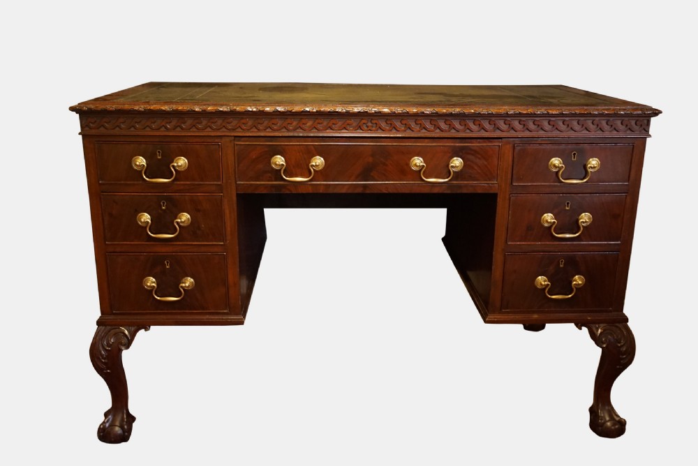 An Edwardian Chippendale Revival Kneehole Writing Table