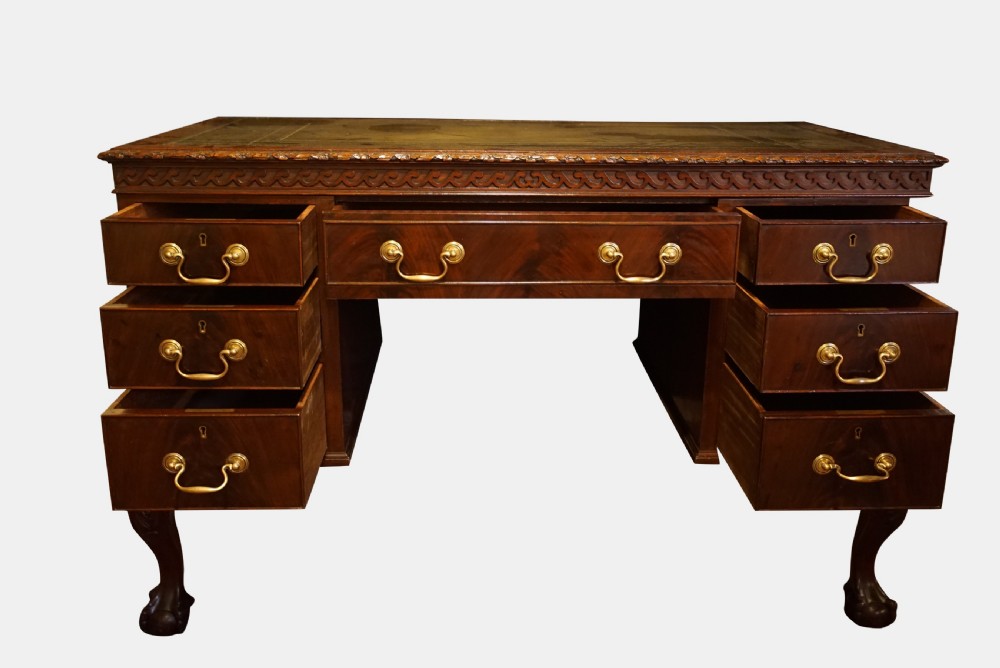 An Edwardian Chippendale Revival Kneehole Writing Table View II