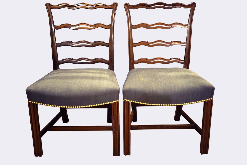  4 Mahogany Ladder Back Chairs and 2 Carvers








6 Mahogany Ladder Back Dining Chairs View II