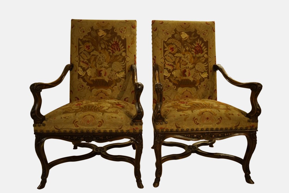 A pair of Walnut Framed French late 19thc Fauteilles