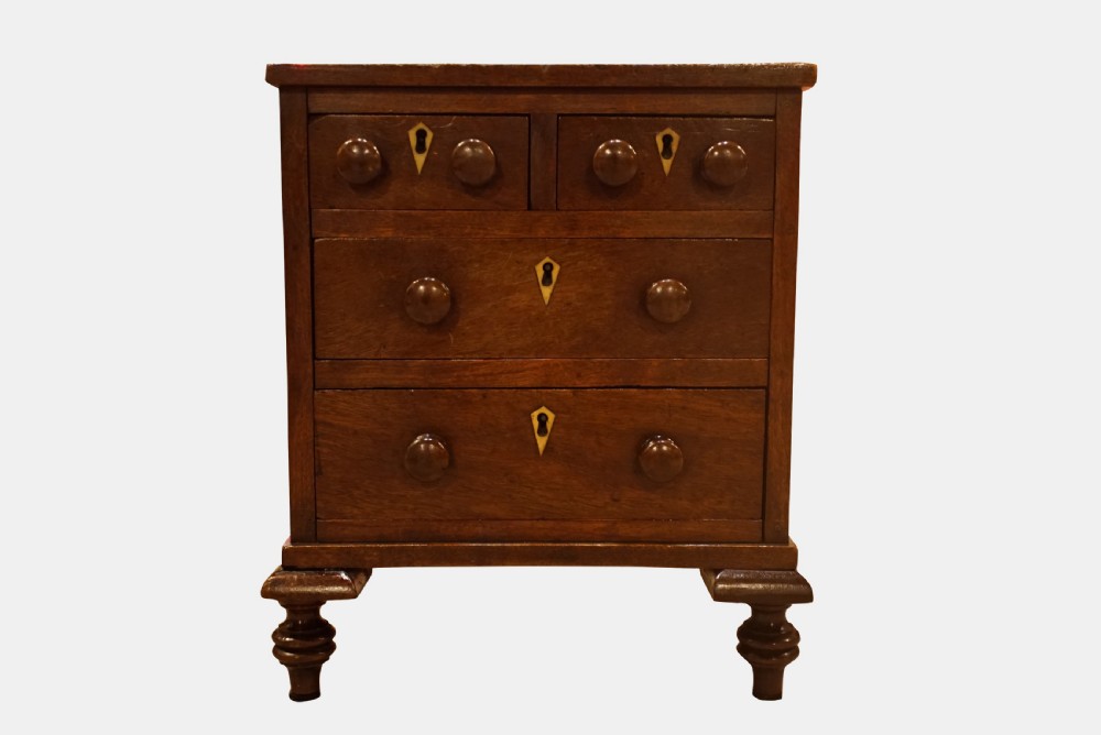 A George III Mahogany Miniature Chest of Drawers
