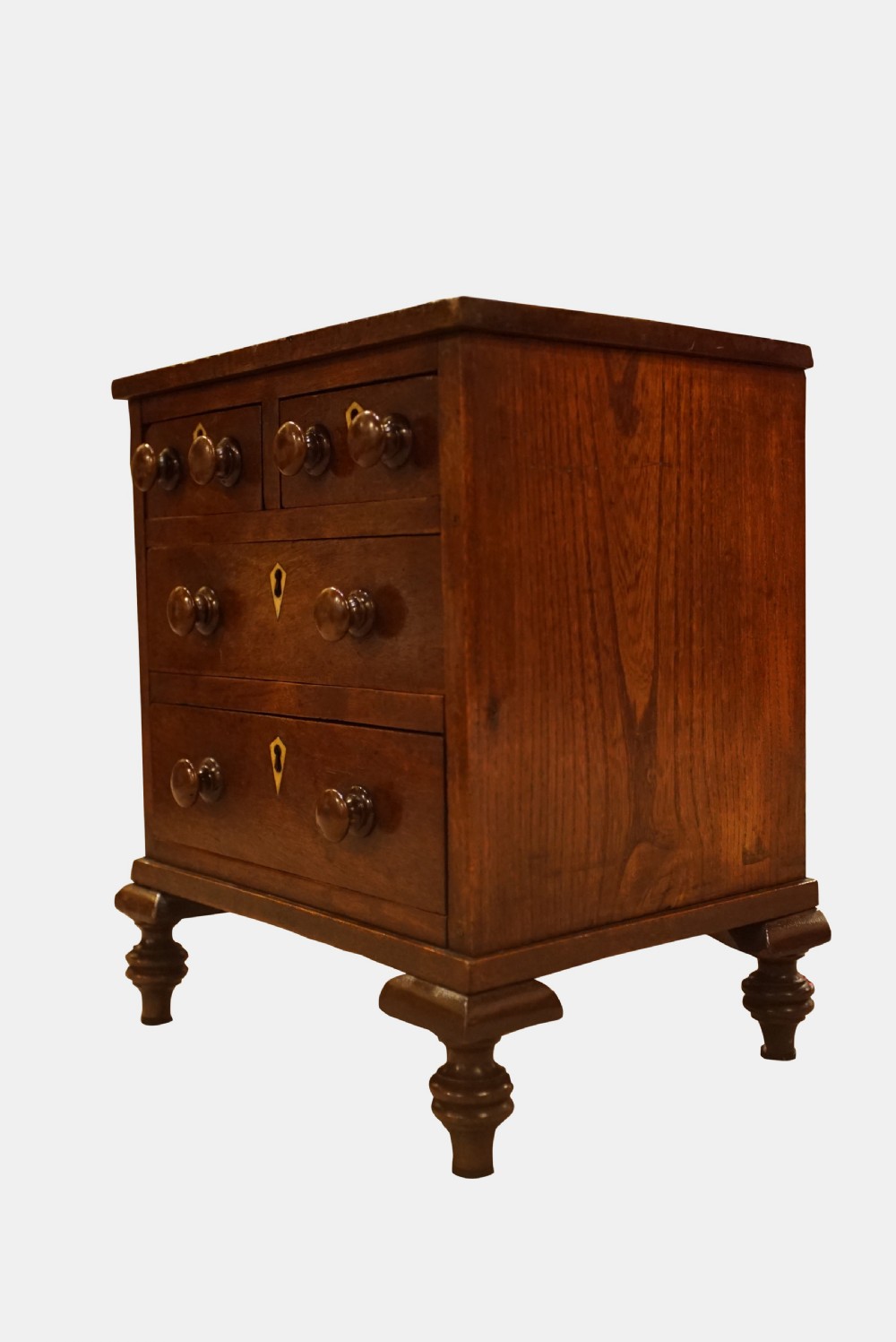 A George III Mahogany Miniature Chest of Drawers View II