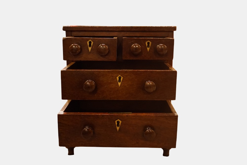 A George III Mahogany Miniature Chest of Drawers View III