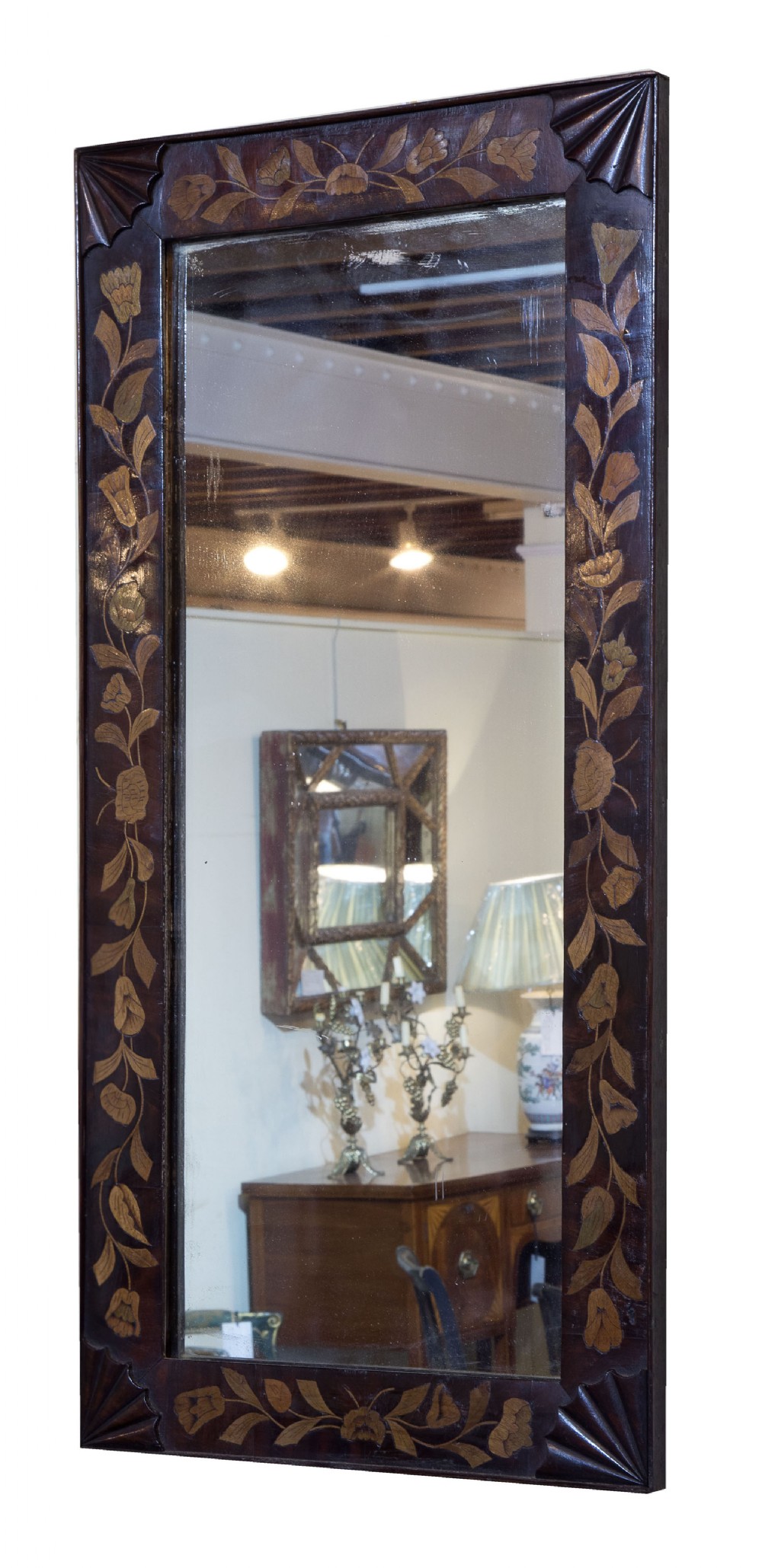 A mahogany and floral Dutch marquetry rectangular mirror with carved corner spandrels C1820