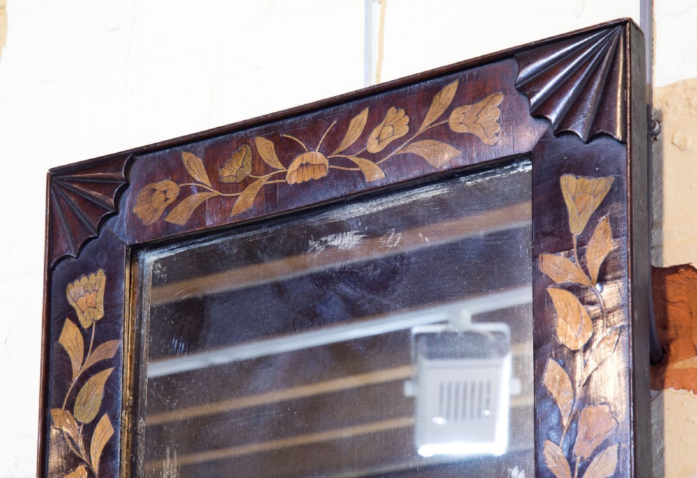 A mahogany and floral Dutch marquetry rectangular mirror with carved corner spandrels C1820 View IV