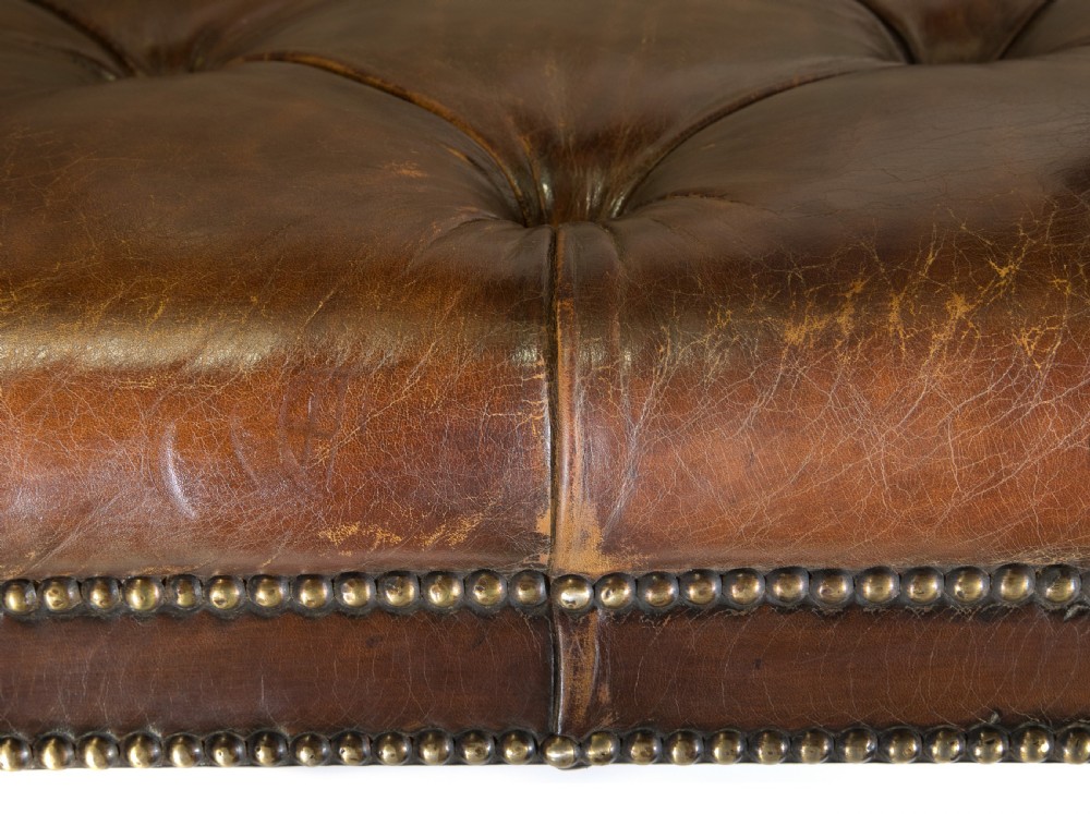 Deep buttoned leather country house stool 20thC View VI