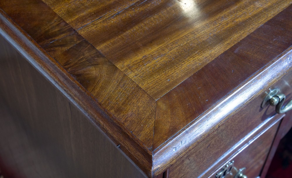 Striking George III mahogany kneehole desk with original hardware View VI