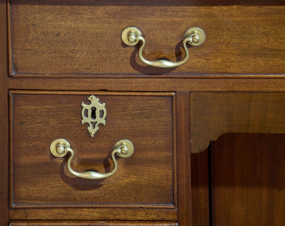 Striking George III mahogany kneehole desk with original hardware View VII