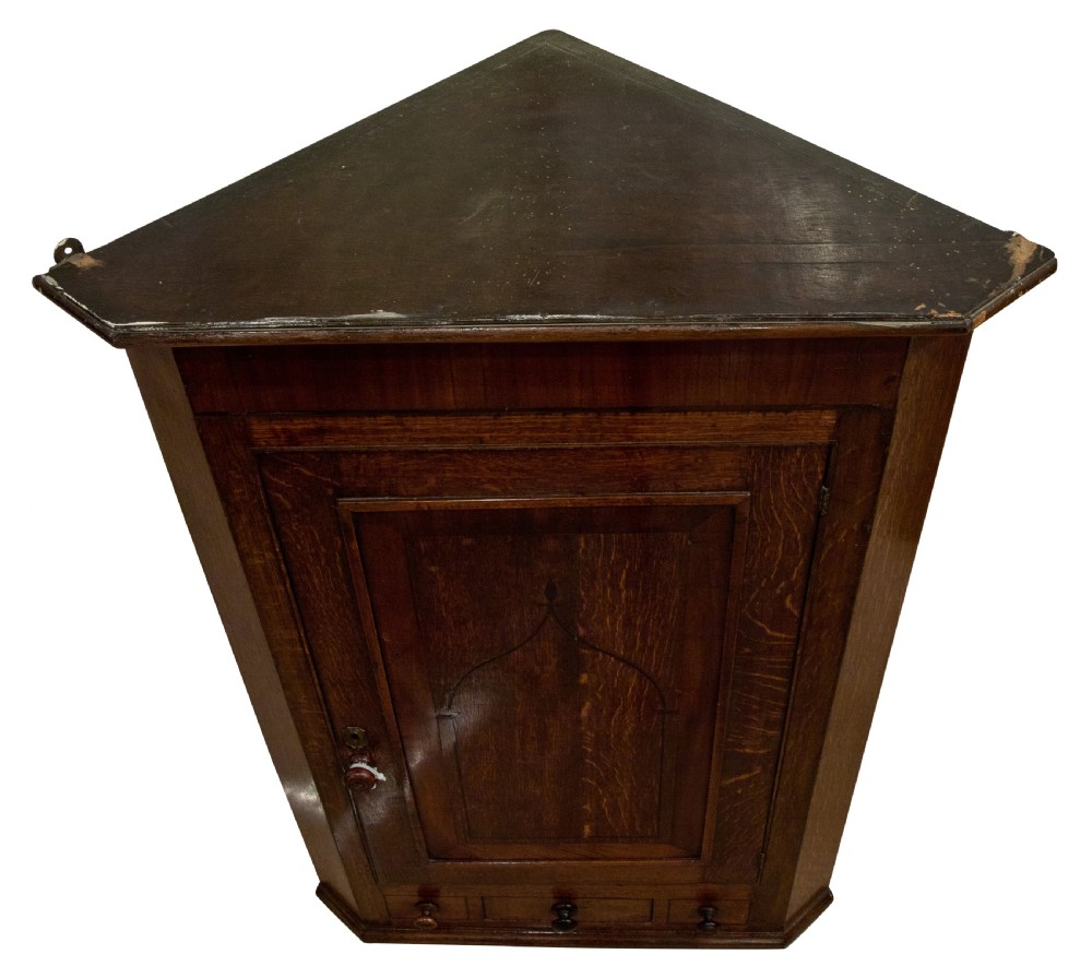 Early 19thC oak corner cupboard View V
