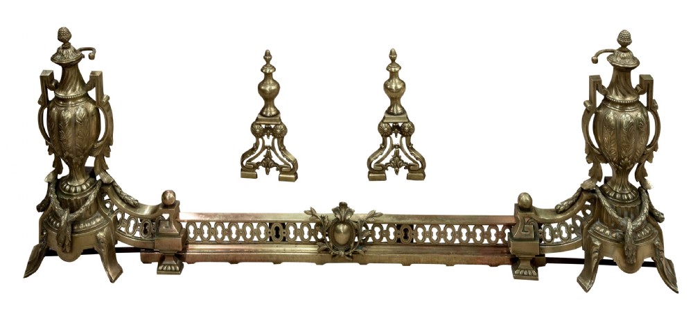 
Brass extending fender and two fire dogs c1900