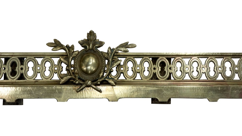 
Brass extending fender and two fire dogs c1900 View VI