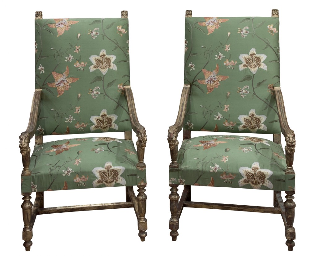 Pair of distressed gilt framed armchairs c1830-50