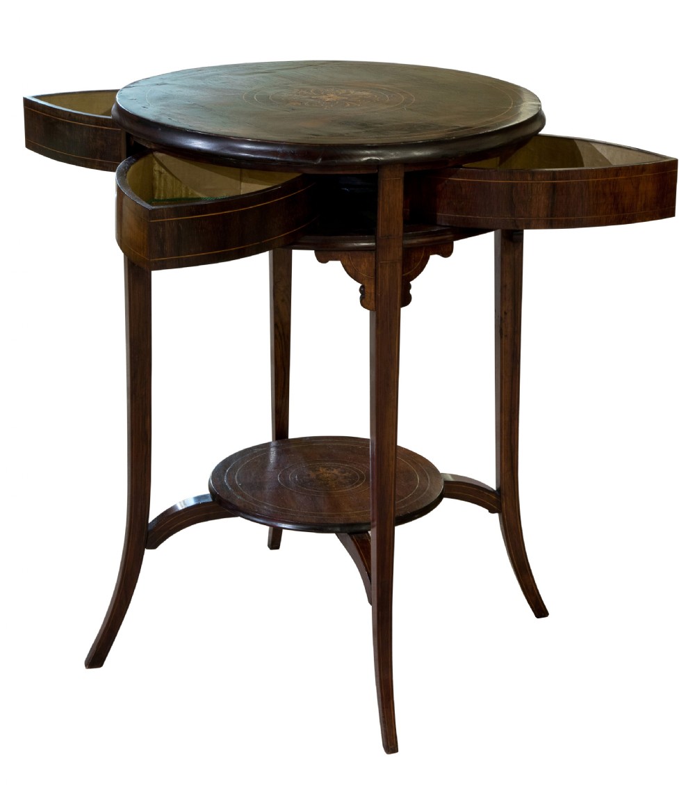 Circular inlaid drum table with rotating top to reveal four drawers View II