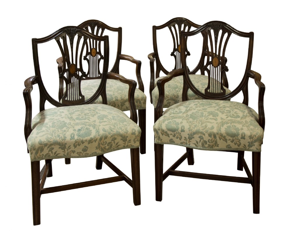 Set of four mahogany Hepplewhite style shield back armchairs