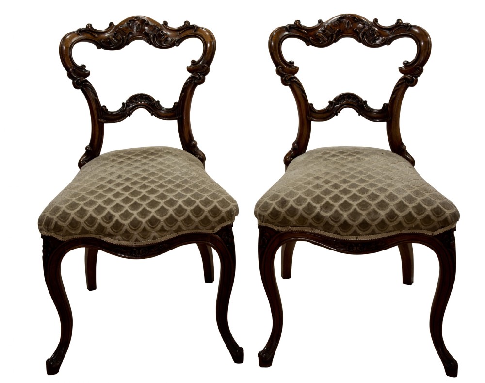 Pair of walnut side chairs c1855