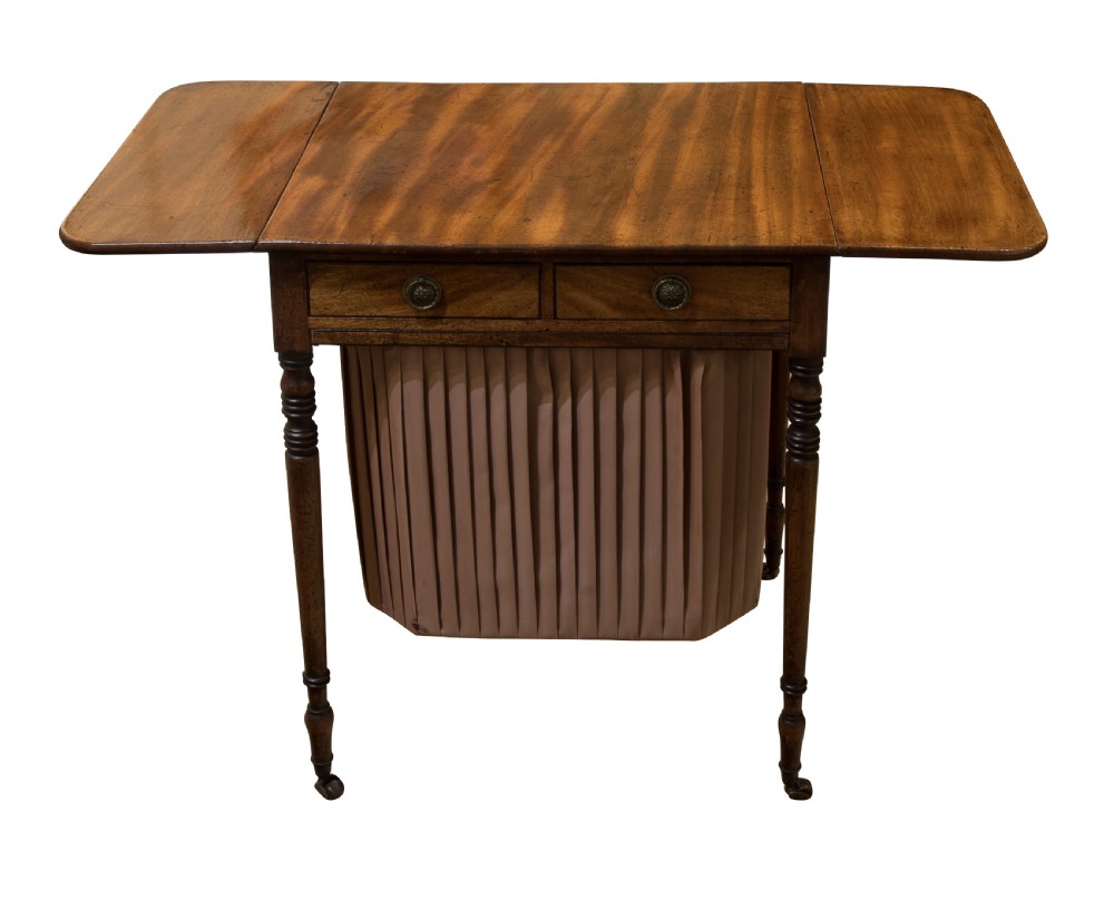 Regency period sewing/sofa table standing on fine turned legs View IV