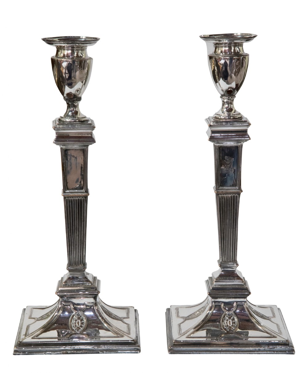 Pair of Old Sheffield plate candlesticks with vase shaped sconces