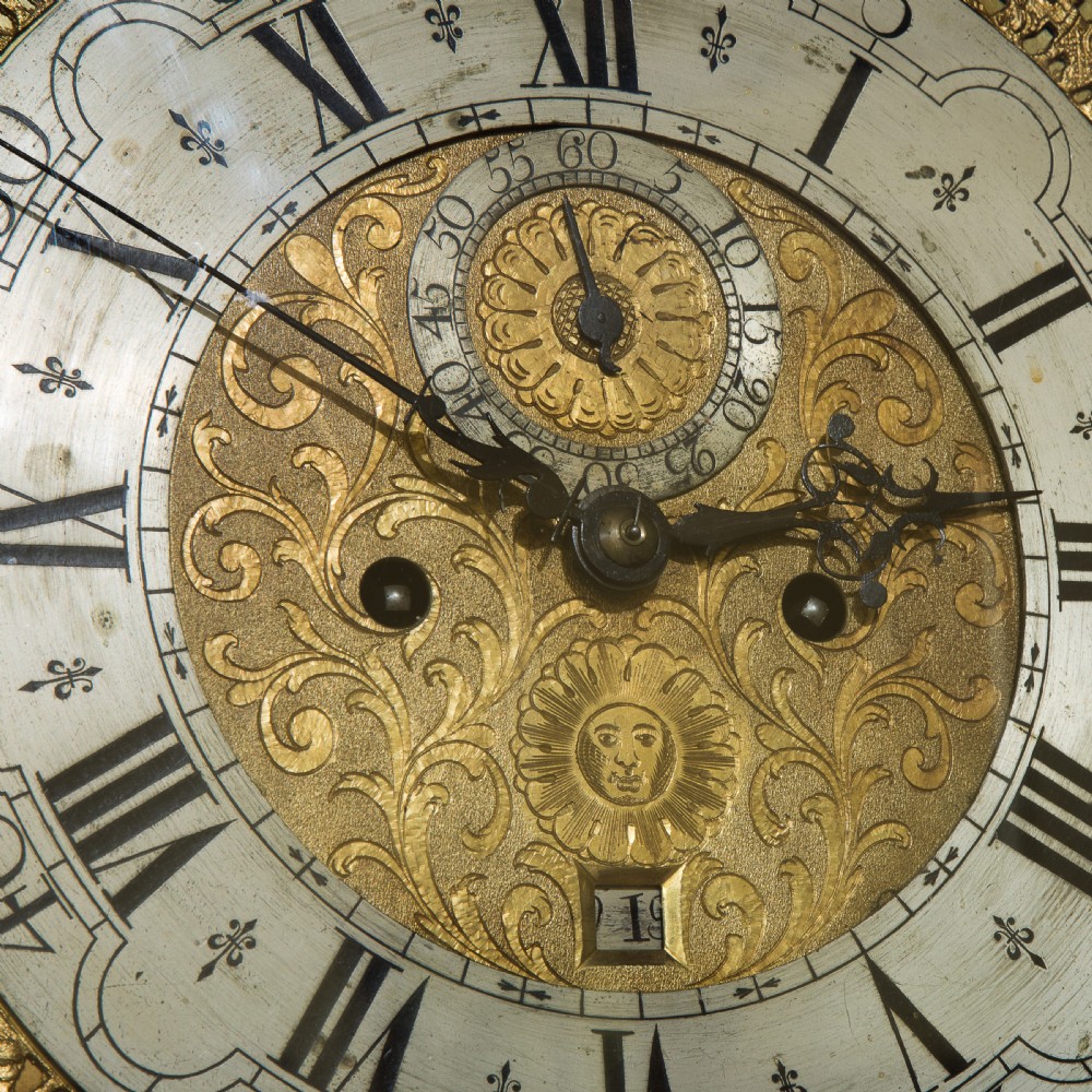 8 day brass faced oak cased longcase clock with arched dial c1780 View V