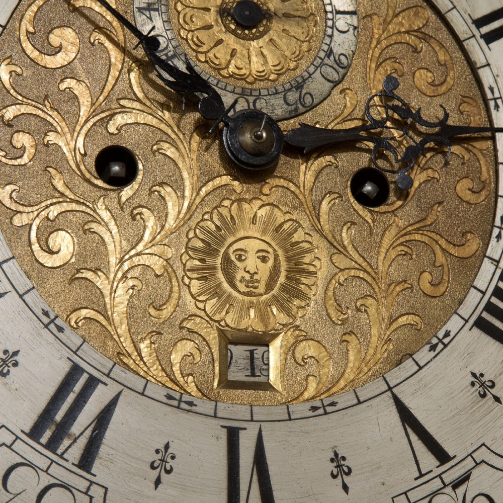 8 day brass faced oak cased longcase clock with arched dial c1780 View IX
