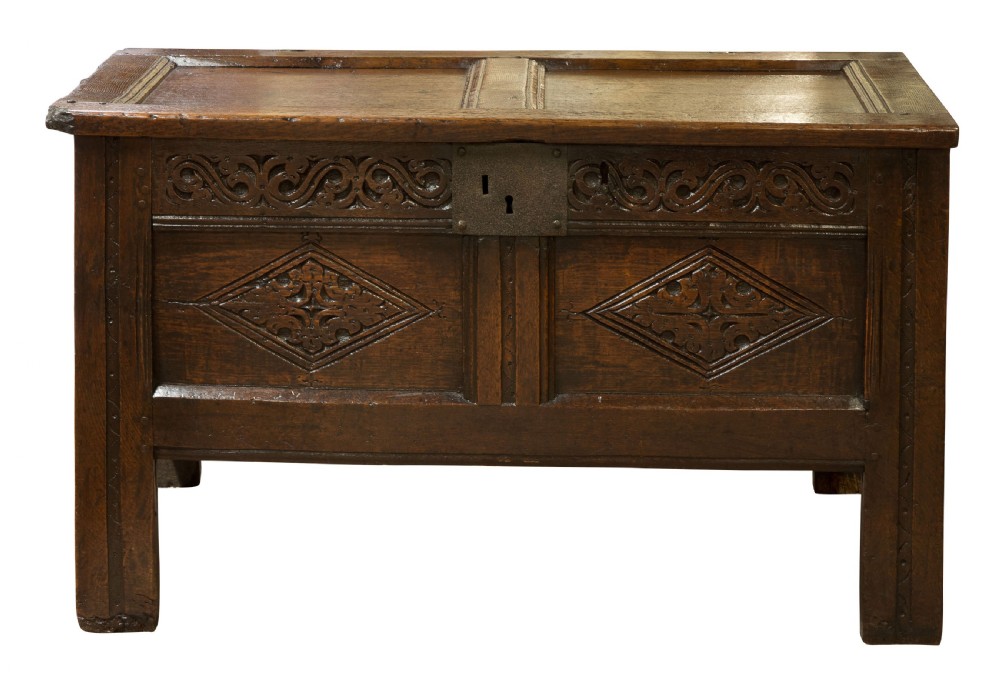 Mid 17thC panelled oak coffer with carved running strap work c1650 View III