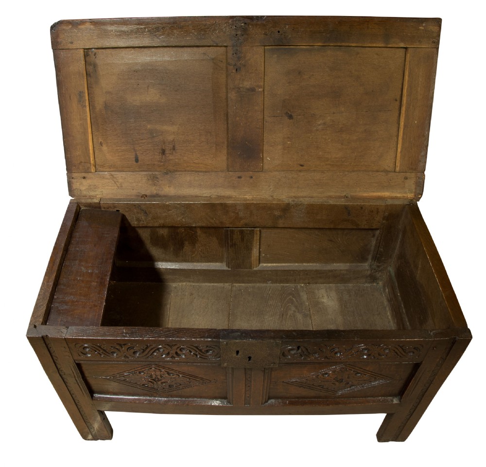 Mid 17thC panelled oak coffer with carved running strap work c1650 View VI