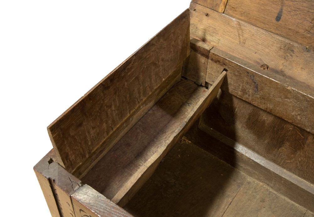 Mid 17thC panelled oak coffer with carved running strap work c1650 View VII