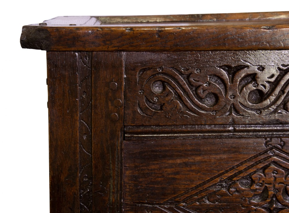 Mid 17thC panelled oak coffer with carved running strap work c1650 View VIII