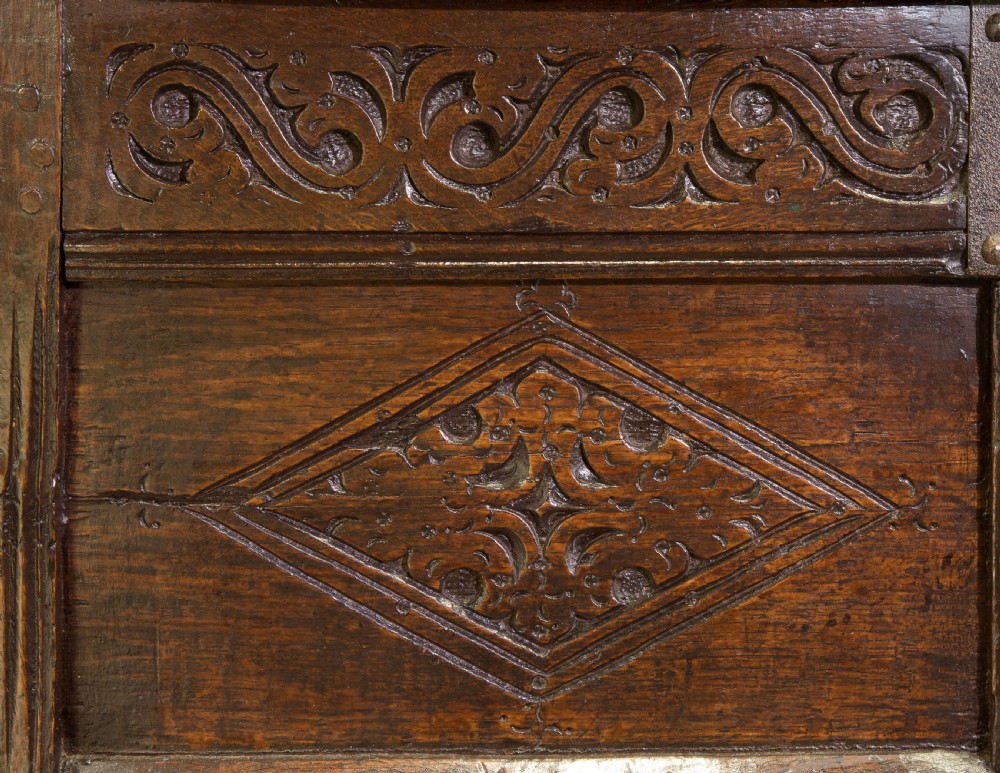 Mid 17thC panelled oak coffer with carved running strap work c1650 View IX