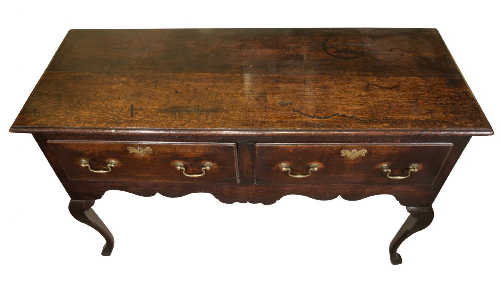 George III oak dresser base with 2 drawers raised on cabriole legs View IV