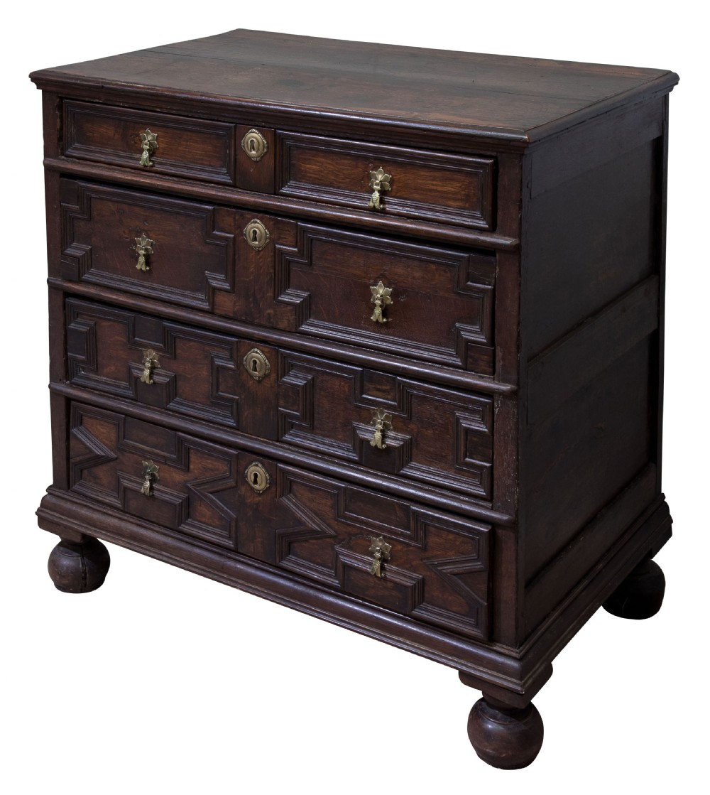 William & Mary period moulded front oak chest on bun feet c1690