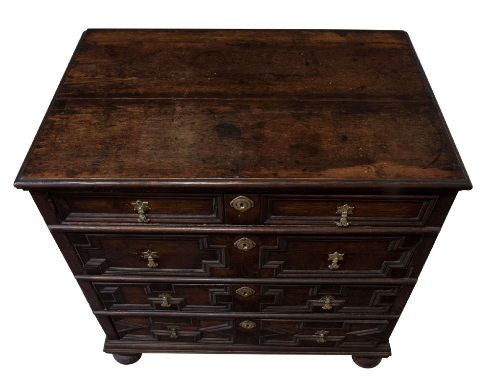 William & Mary period moulded front oak chest on bun feet c1690 View IV