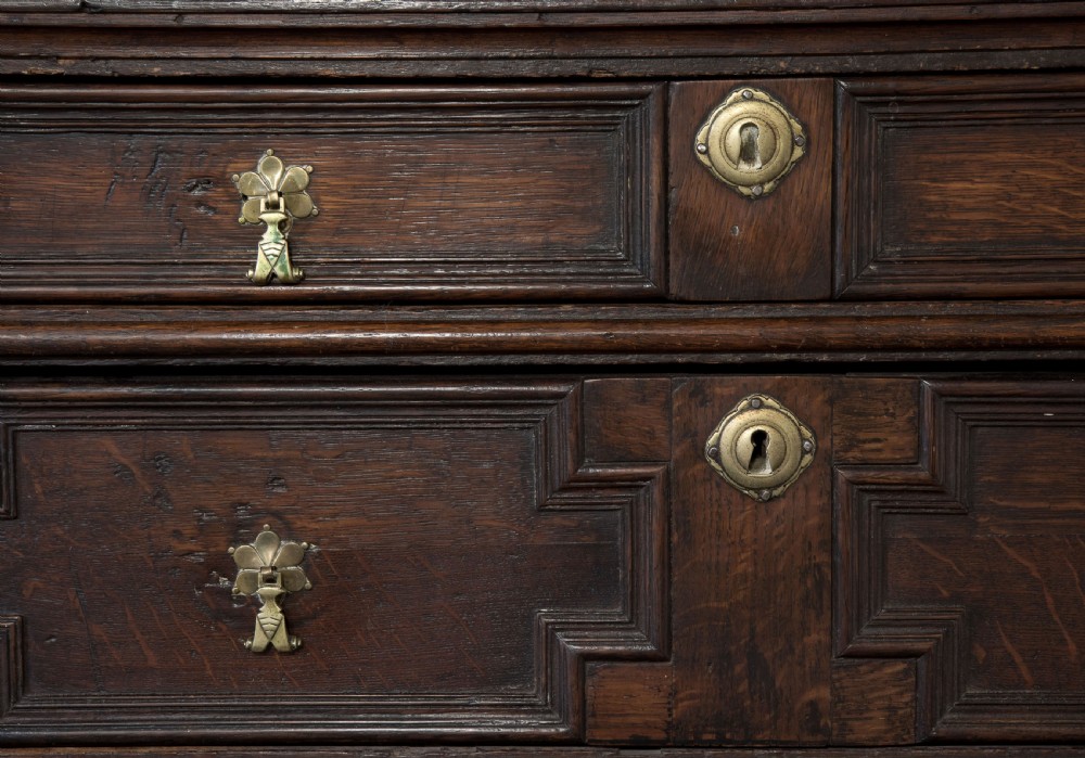 William & Mary period moulded front oak chest on bun feet c1690 View V