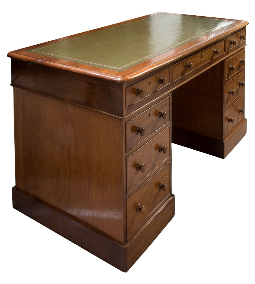 Early Victorian mahogany kneehole desk with green tooled leather