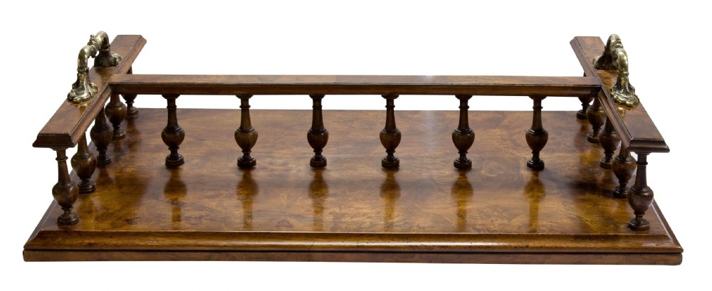 A Victorian figured walnut twin section book tray View II