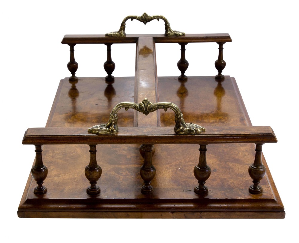 A Victorian figured walnut twin section book tray View III