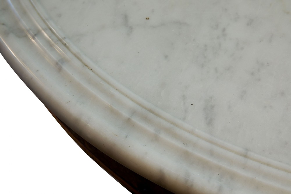 A good Charles X Gueridon with white marble top View III