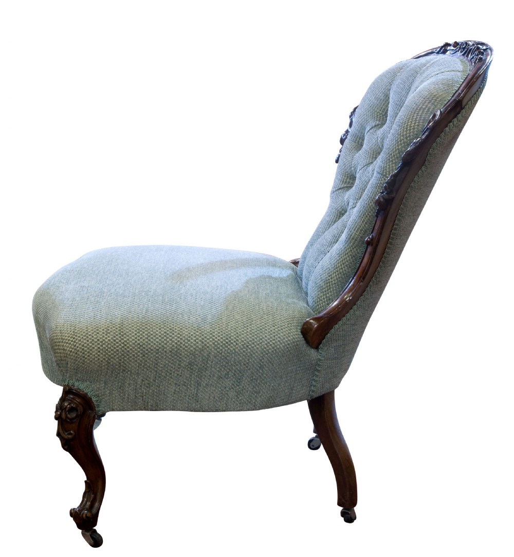 Victorian carved Walnut framed button back easy chair View IV