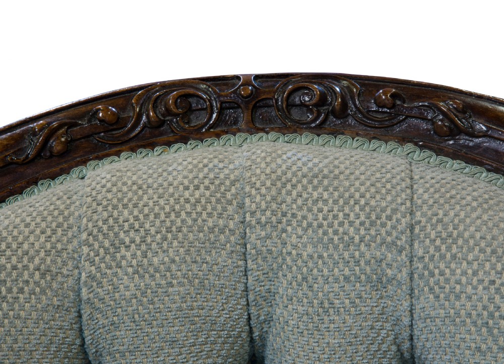 Victorian carved Walnut framed button back easy chair View IX