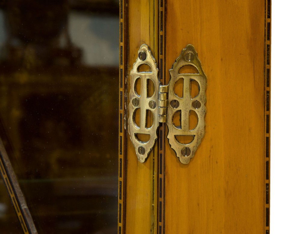A fine quality Edwardian glazed satinwood corner cabinet View V