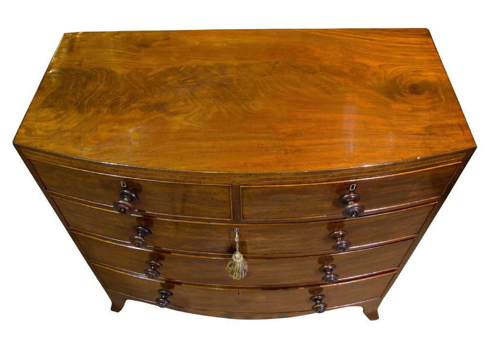 A Regency Period Mahogany Bow-fronted Chest View VII