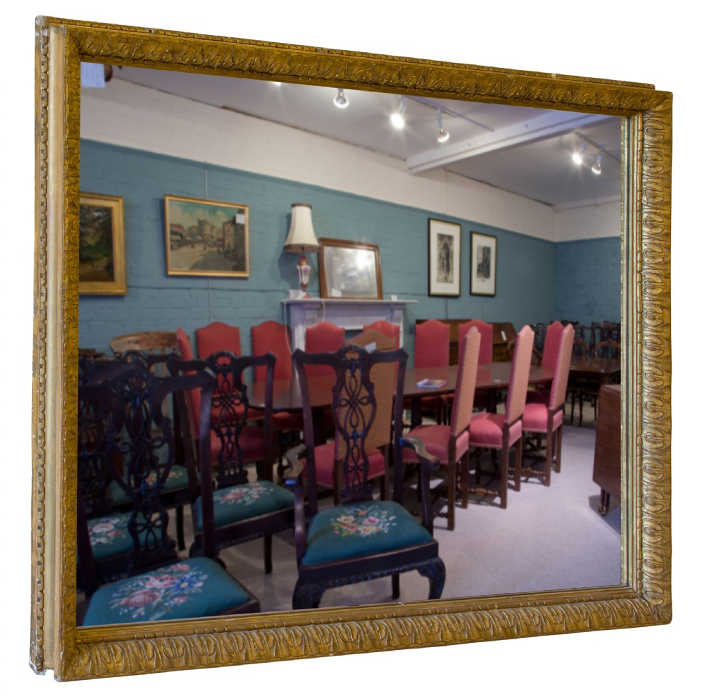 A large decorative giltwood wall mirror