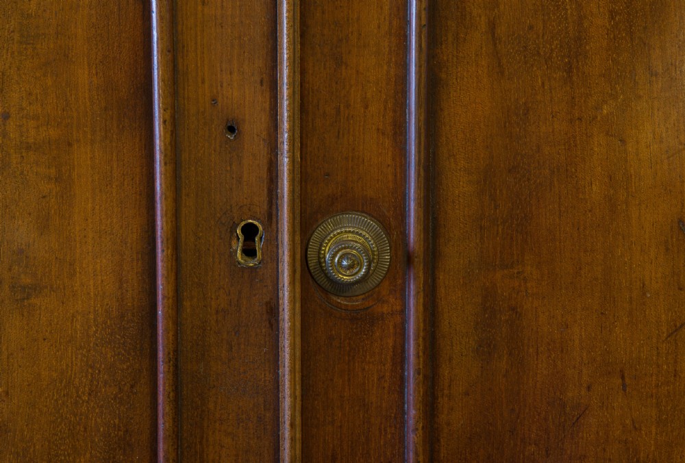 A late Victorian mahogany two door cupboard View V