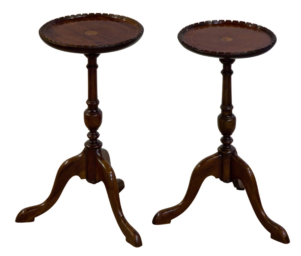 A pair of Edwardian mahogany and satinwood tables