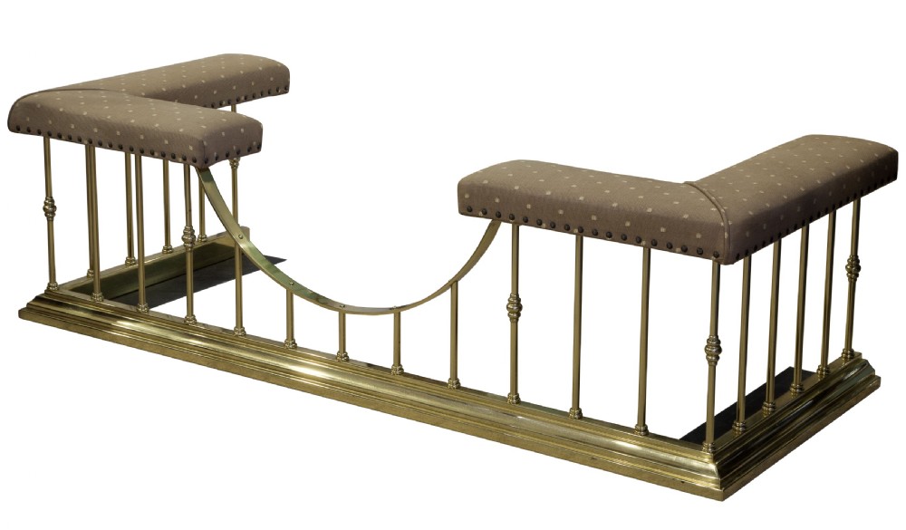 A Brass and Upholstered Club Fender