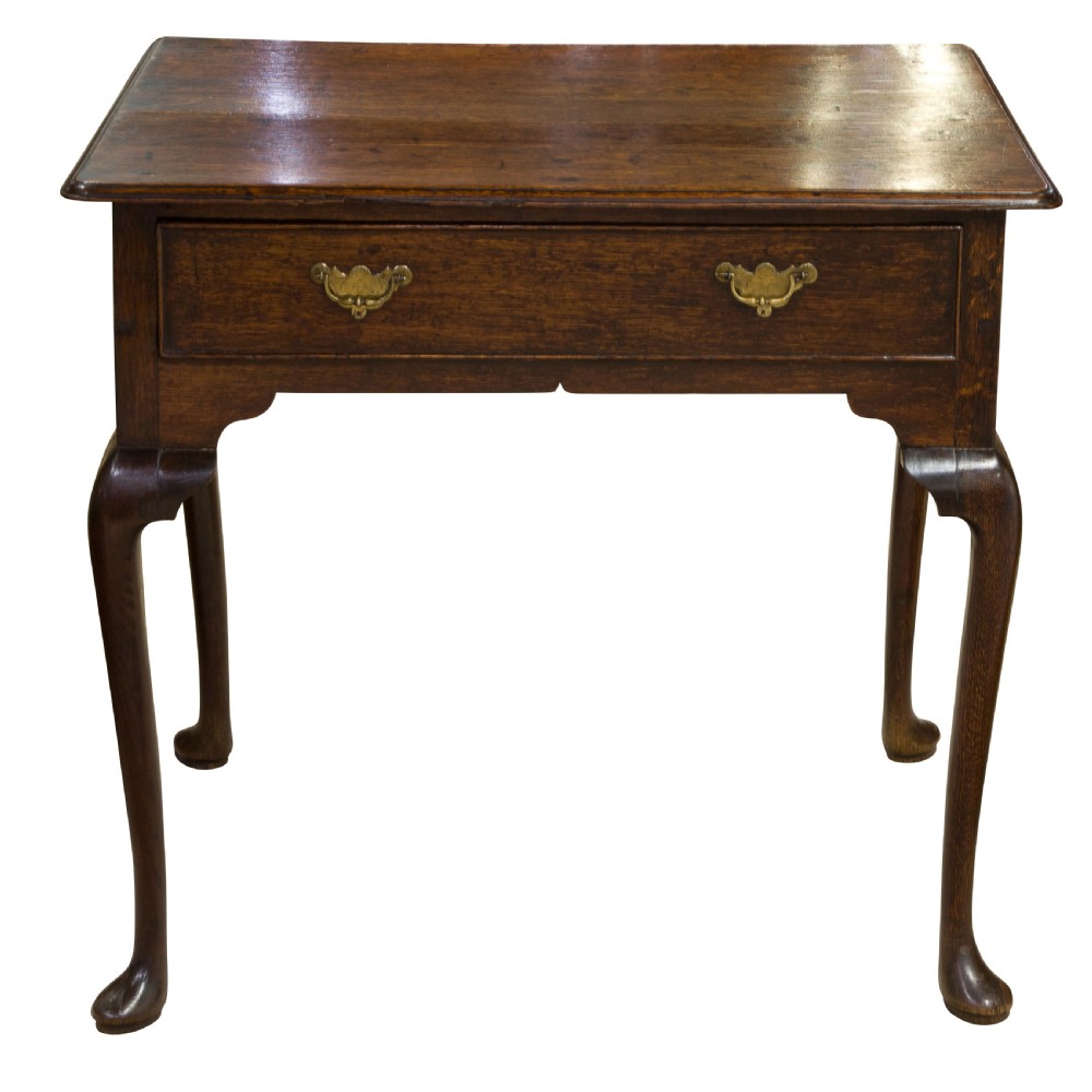 A George II Oak single drawer side table with original brass handles View III